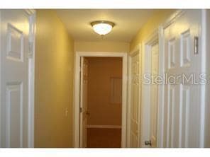 Hall. Coat closet on right then door to bathroom and door for storage closet.  Straight ahead is door to 2nd bedroom