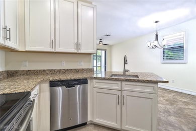 Kitchen with appliances with stainless steel finis