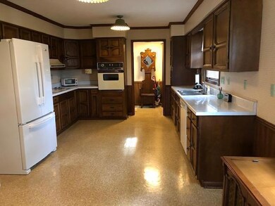 Kitchen.  Island has been moved aside.