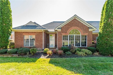 Front facade featuring a front yard