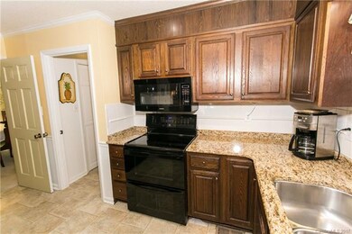 The kitchen was updated in 2013 (granite counterto