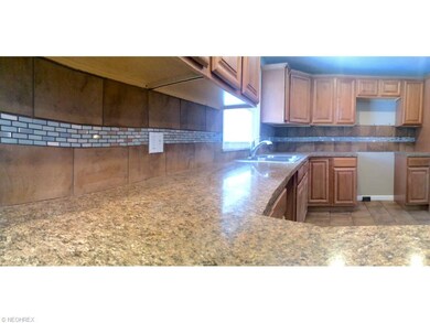Plenty of cabinet space + eat-in-kitchen