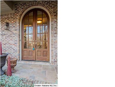 Stately front entrance allows a flood of natural l