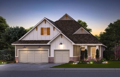 View of front of house with a garage and a yard