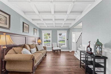 Easy-care wood-look laminate plank floors flow thr