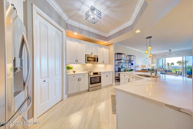 Magnolia Bay unit 105, Cocoa Beach, FL 32931 - photo 4