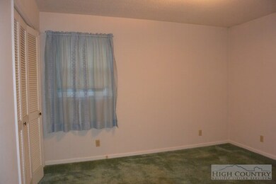 Bedroom 2: This bedroom also features a 1/2 bath.