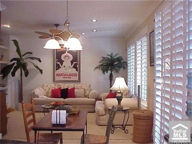 Family room situated along the rear of the home wi