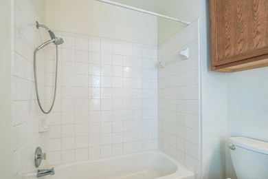 Full bathroom with washtub / shower combination