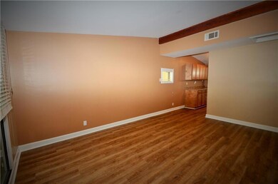Walk in to this warm, relaxing family room!