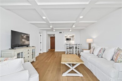 Spacious open living area.  Beautiful coffered ceiling with integrated lighting.