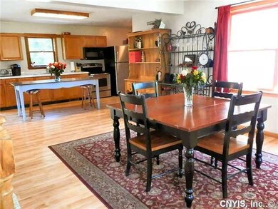 Kitchen Dining. The Dining Room flows seamlessly i