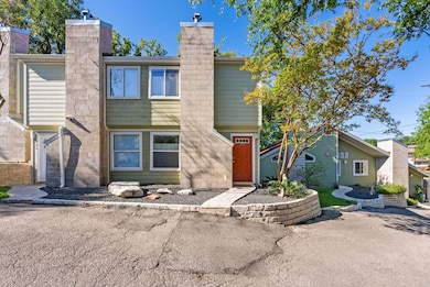 View of front of home featuring a chimney