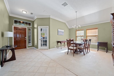 Entering the home, the home office and dining room are to your left.  High ceilings and crown molding add to the charm of this home.