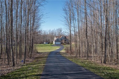 Wooded lot with a fantastic driveway, imagine this