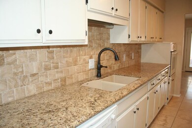 Beautiful Granite and Stone backsplash