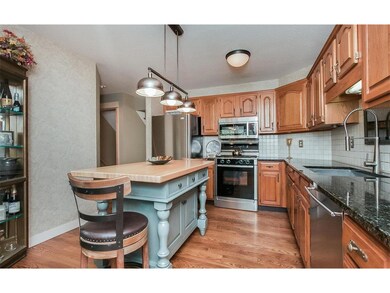 Updated kitchen with granite counters and stainles