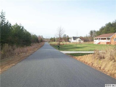 Exterior Front - Pretty country neighborhood with large lots