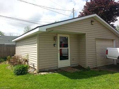 Newer one car detached garage with electricity