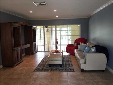 16550 Royal Poinciana Ct, Weston, FL 33326 - photo 2