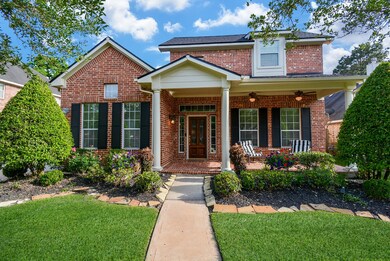 Beauituful landscaping and front porch create A+ curb appeal.