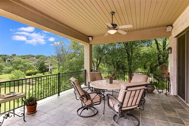 View of patio / terrace featuring ceiling fan, ou