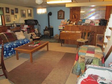 LOWER LEVEL IS FINISHED WITH FAMILY ROOM AREA, BAR
