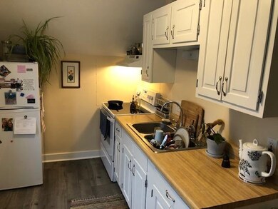 Eat-in kitchen with new laminate floor installed