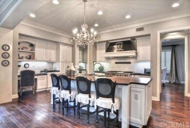 Built-in desk and butler's pantry with beverage re