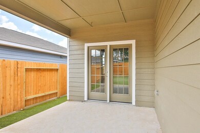 Enjoy the outdoors on this amazing cover back patio.