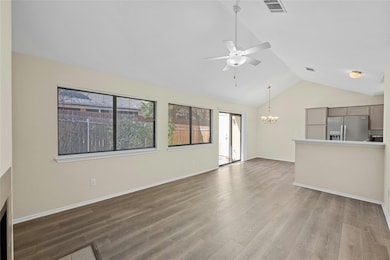 Unfurnished living room featuring visible vents, 