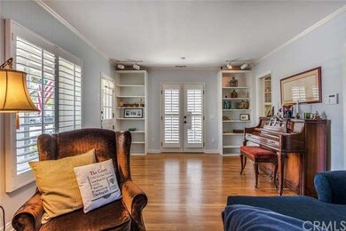 Living room view #4 with double French doors that 