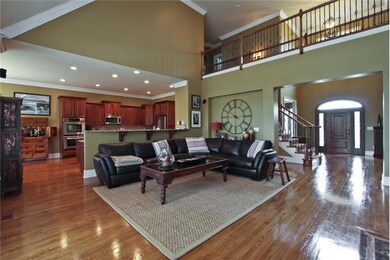 Two Story Great Room - this is a wonderful gathering space with tons of room.  The Great Room is open to the Kitchen with fireplace and custom built-ins.