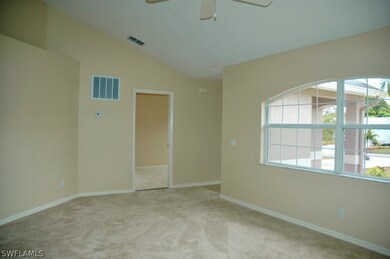 Main living room looking towards converted garage.