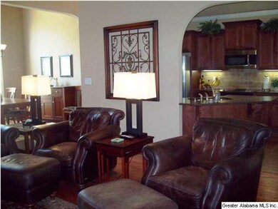 Family Room is open to Kitchen and Dining Room wit