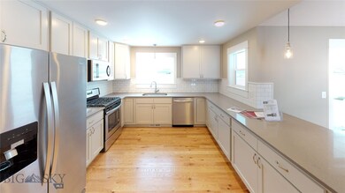 Kitchen- Quartz Counters, Hardwood Floors, Stainle