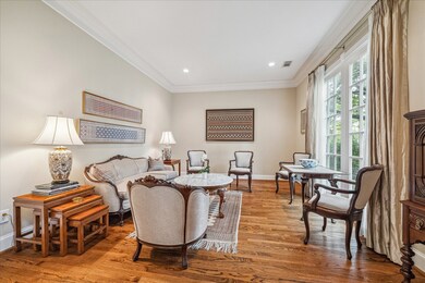 The gracious living room also overlooks the lovely