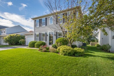 Side view showing extensive landscaping.