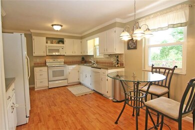 The kitchen is crisp, light, bright, and airy! The
