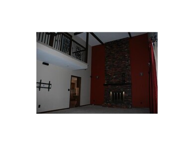 Great room two story fireplace - walks into kitche