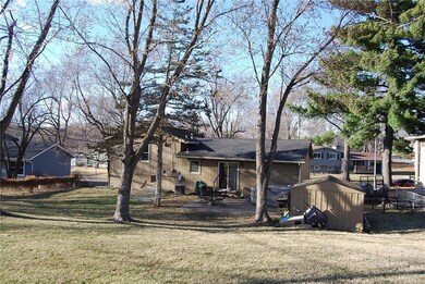 Back of home notice the wonderful trees in the yar