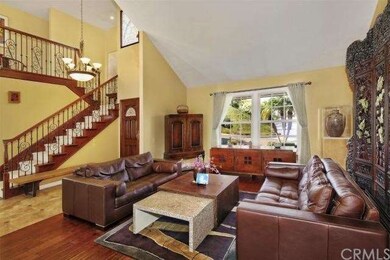 Sweeping staircase with custom railings