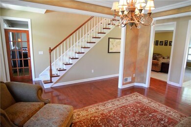 Natural sunlight floods the 9' first floor and spi