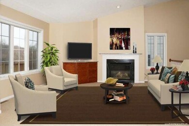 Living room with fireplace, vaulted ceiling and op