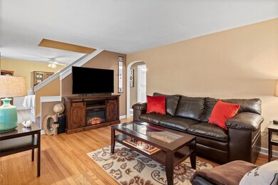 Enter the home directly into the living room and exposed hard wood floors