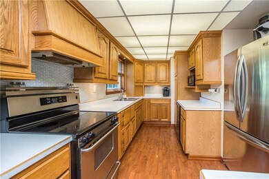 This view into the kitchen gives a sense of the am