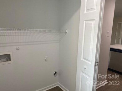 Laundry Area (near Kitchen)