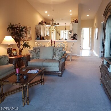 Living dining combo with plush carpeting.