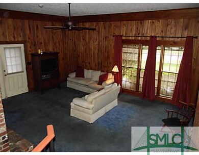 Den/Family/Great Room. Original heart pine panelin