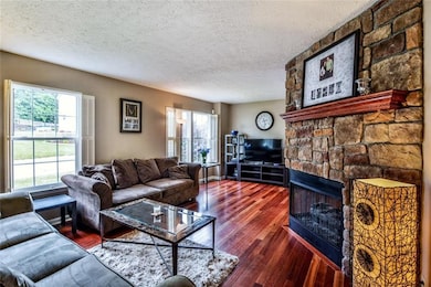 The Open Floor Plan and Oversized Windows Provide 